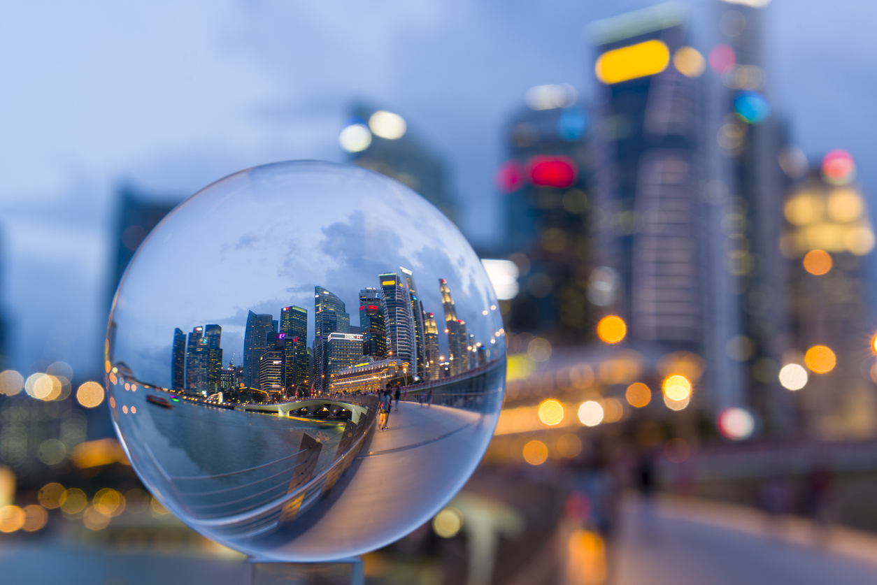 City at dusk through the lens of a crystal ball